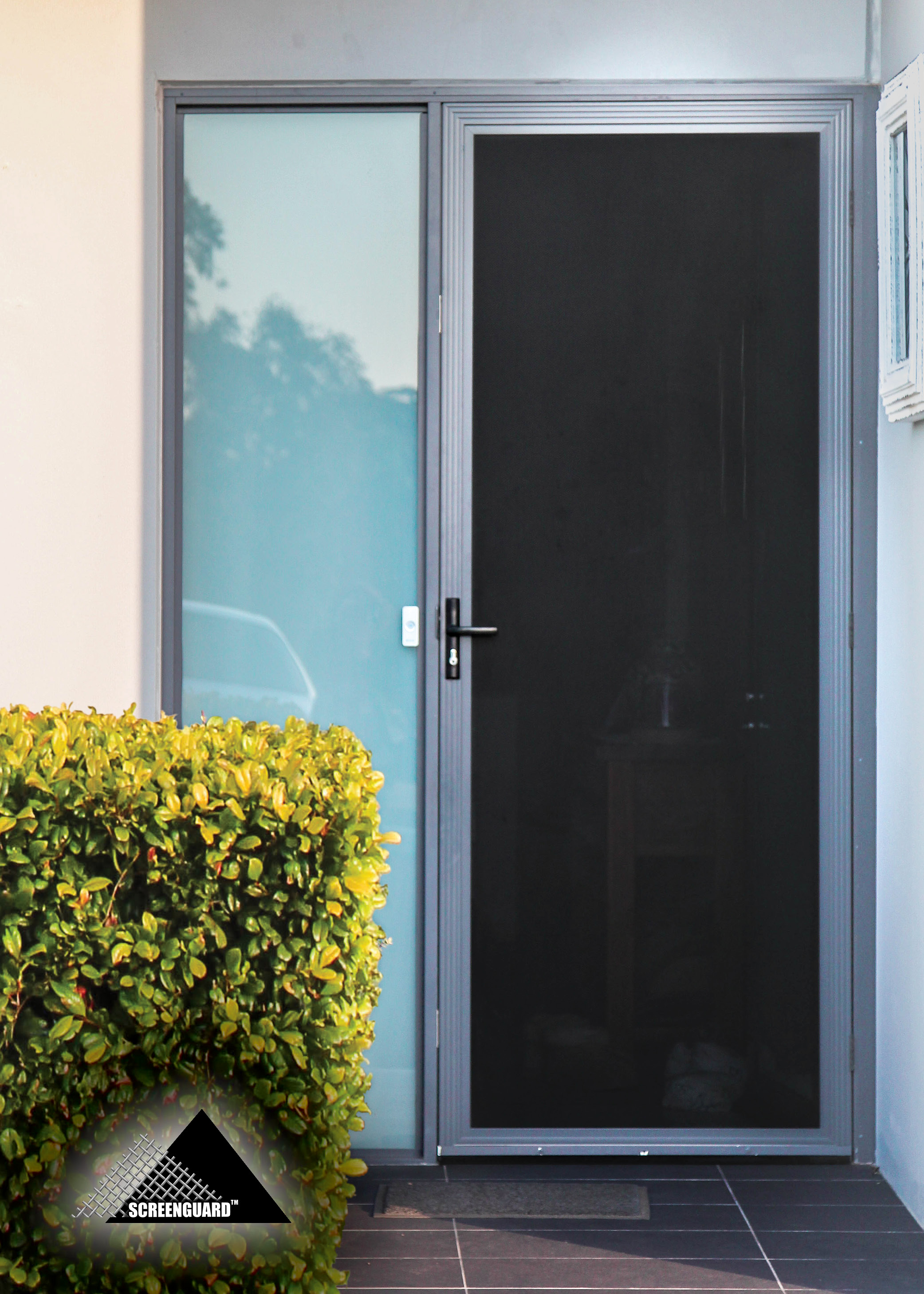 ScreenGuard hinged security door — front entry close-up